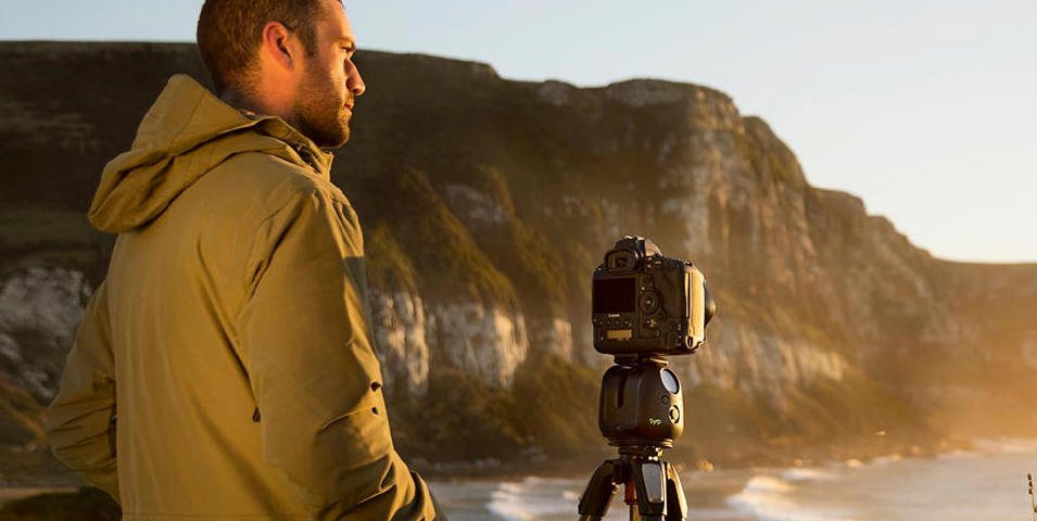 Man standing in front of time-lapse camera