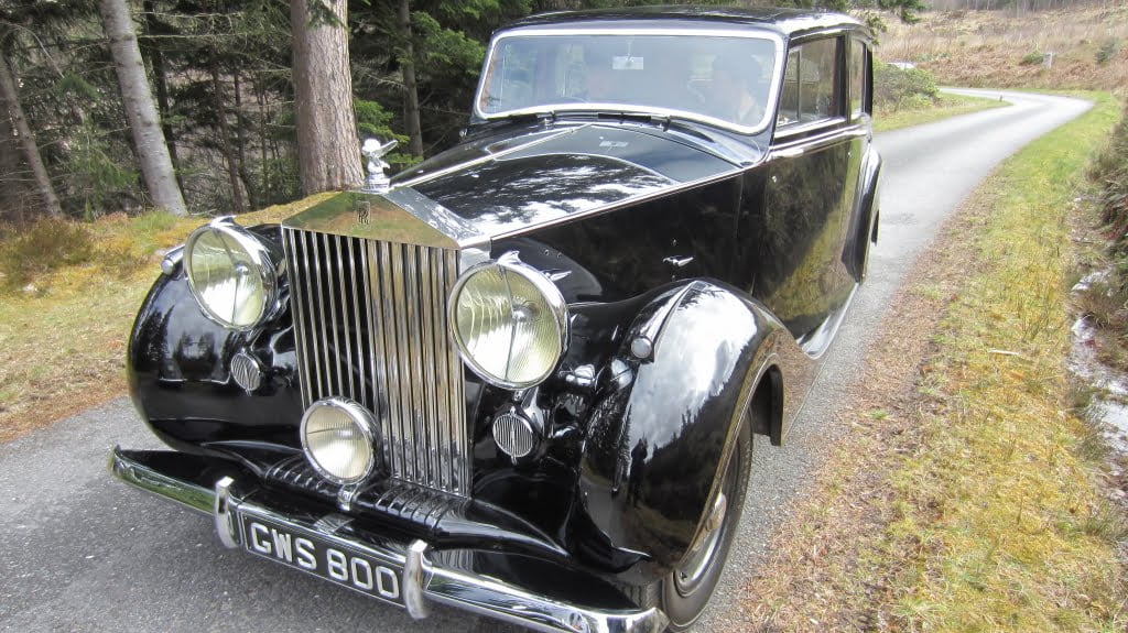 vintage car on location of the Crown Season 2